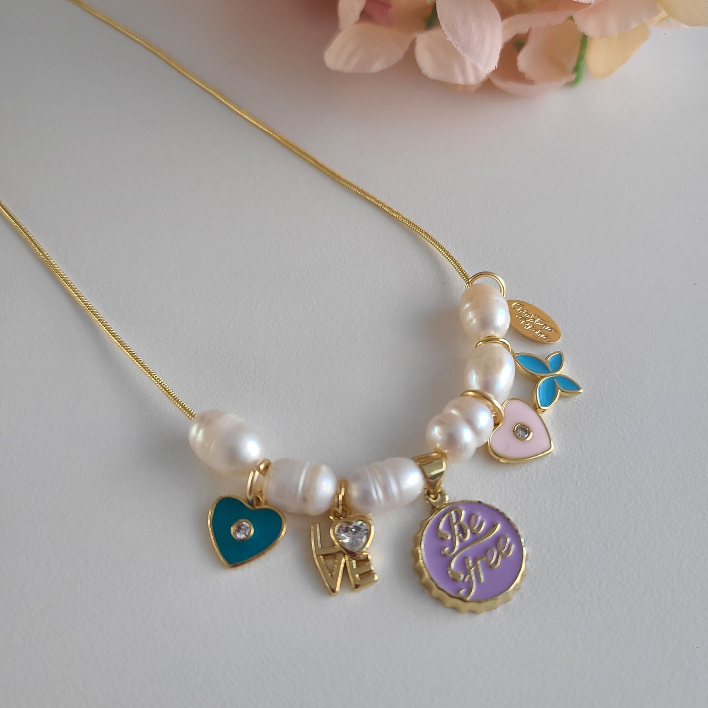 Perles et breloque Be Free