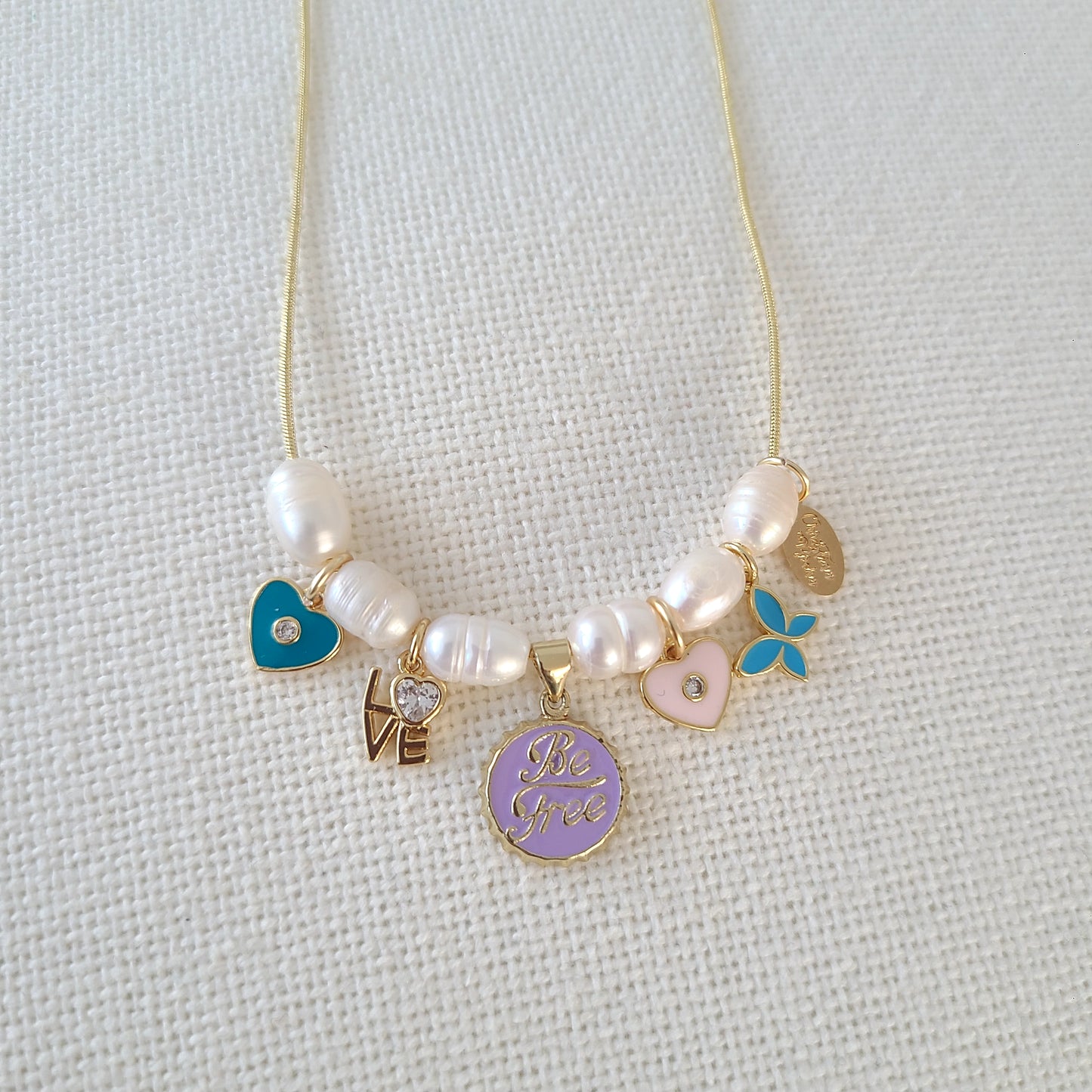 Perles et breloque Be Free