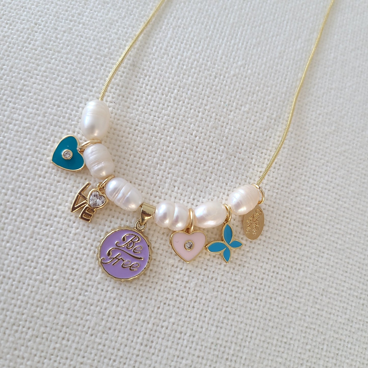 Perles et breloque Be Free