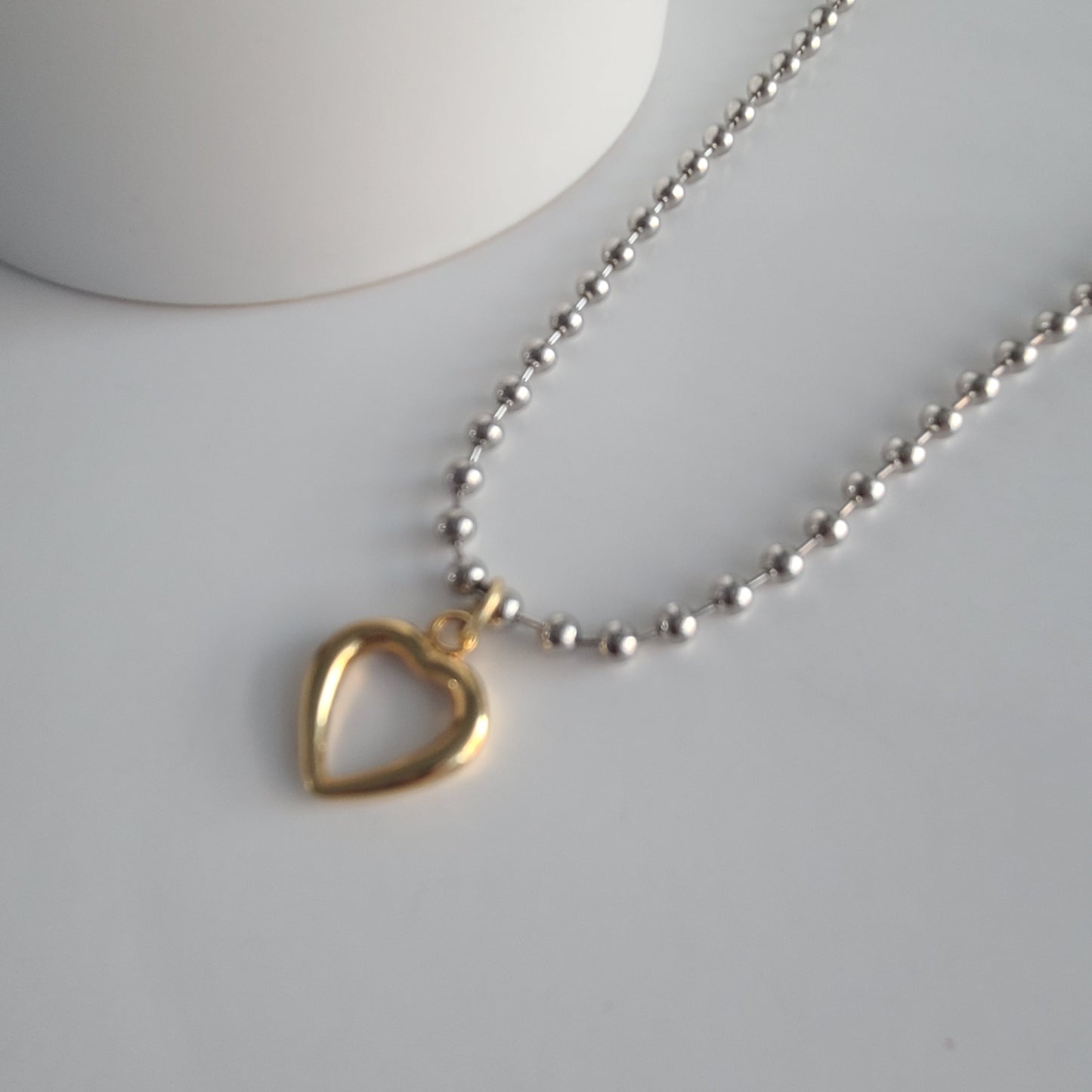 Collier coeur en argent et or