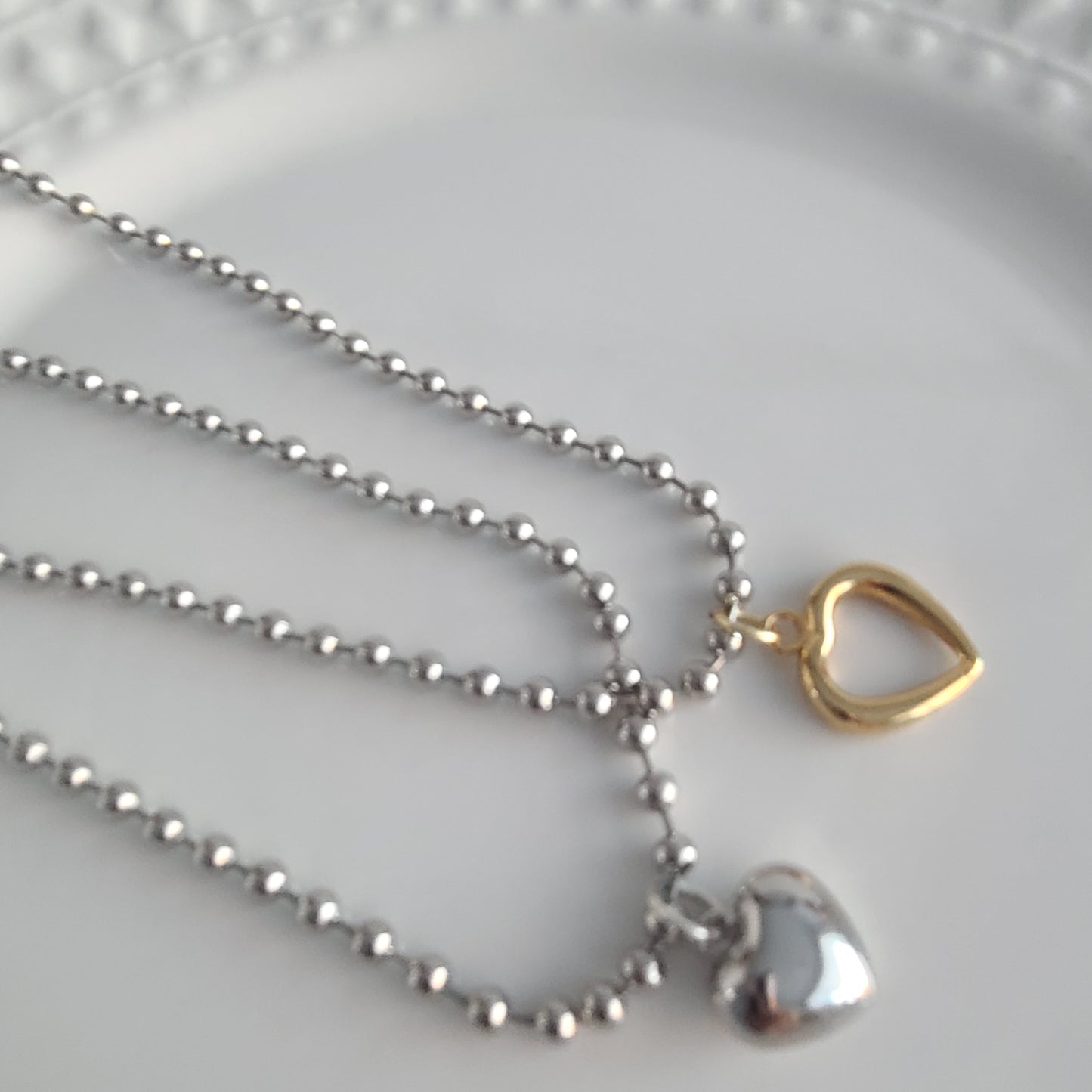 Collier coeur en argent et or