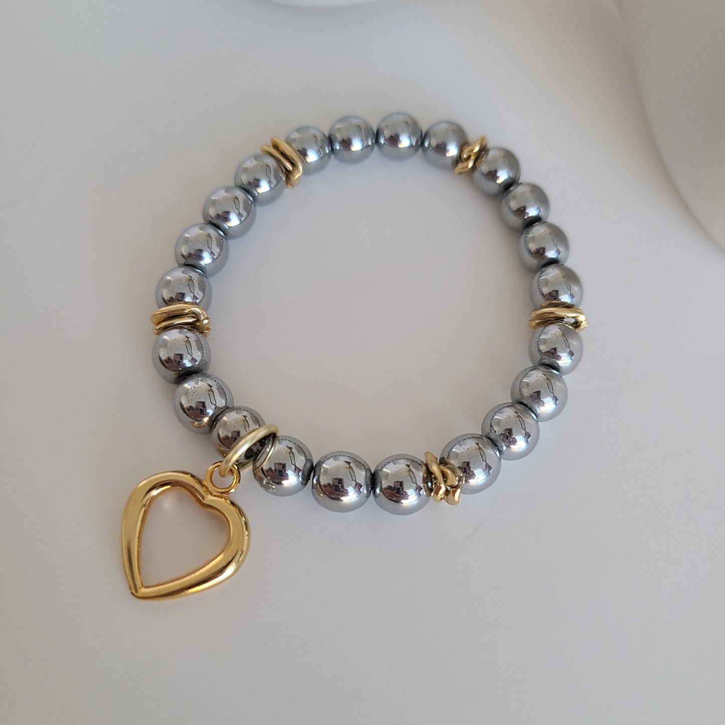 Bracelet coeur en argent foncé et or