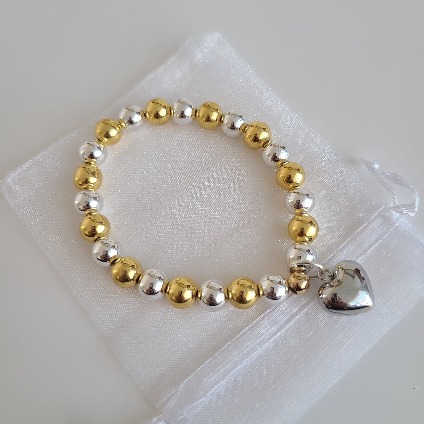 Bracelet d'amour en or et argent