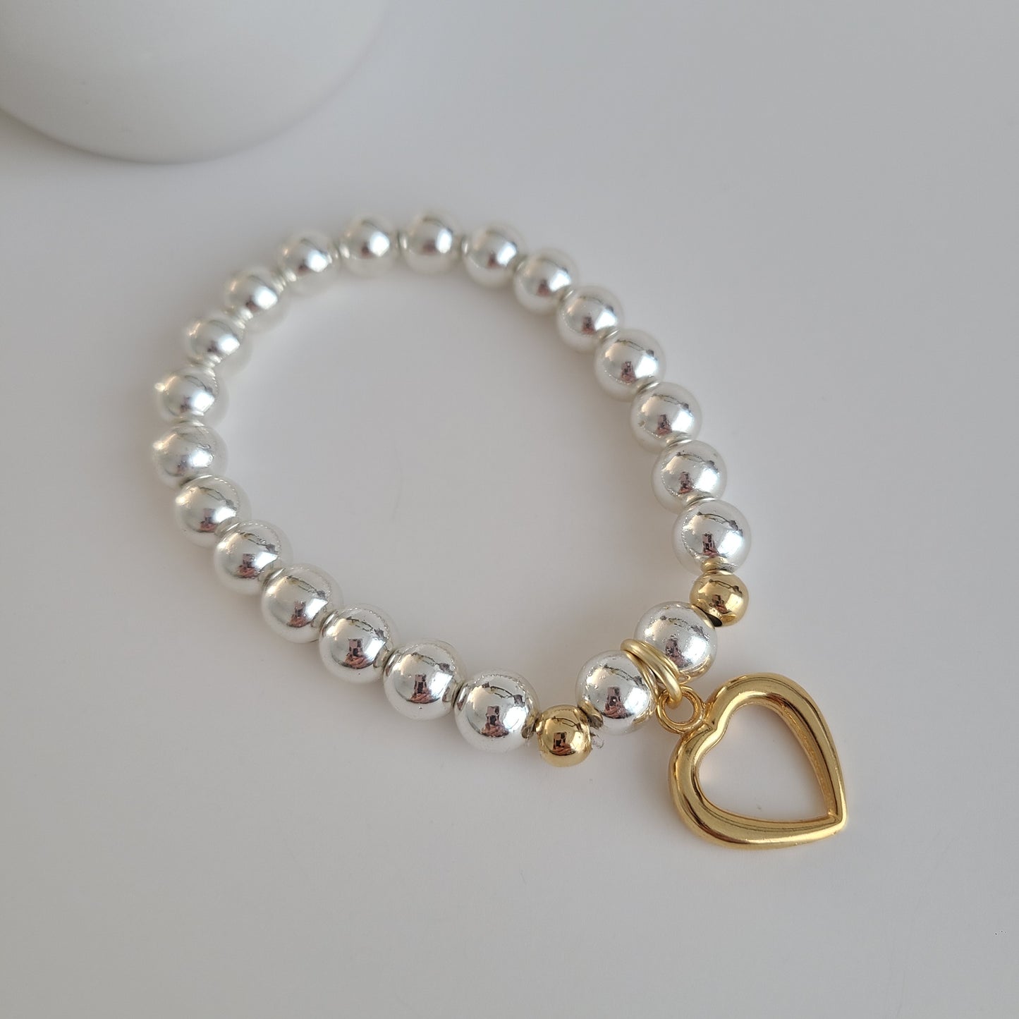 Bracelet coeur en argent et or