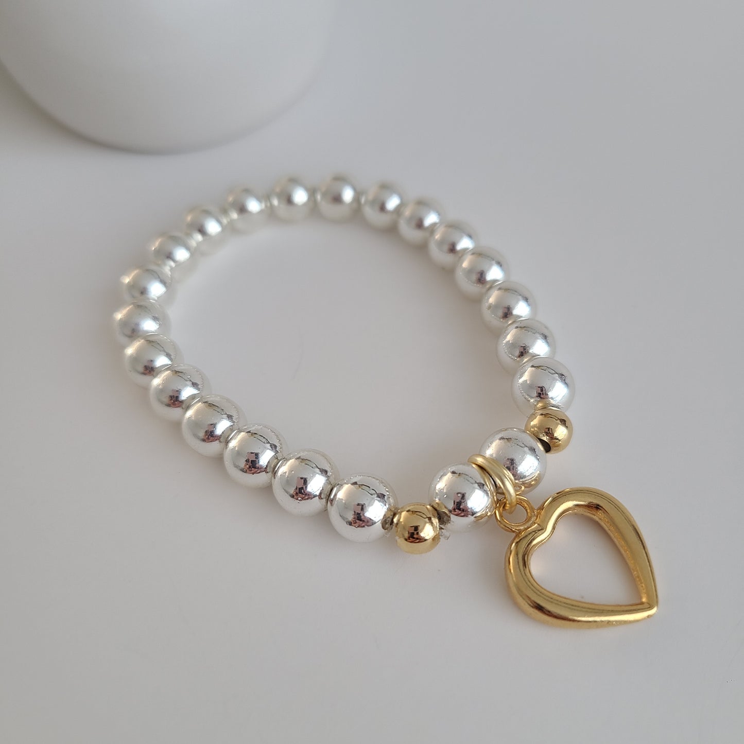 Bracelet coeur en argent et or