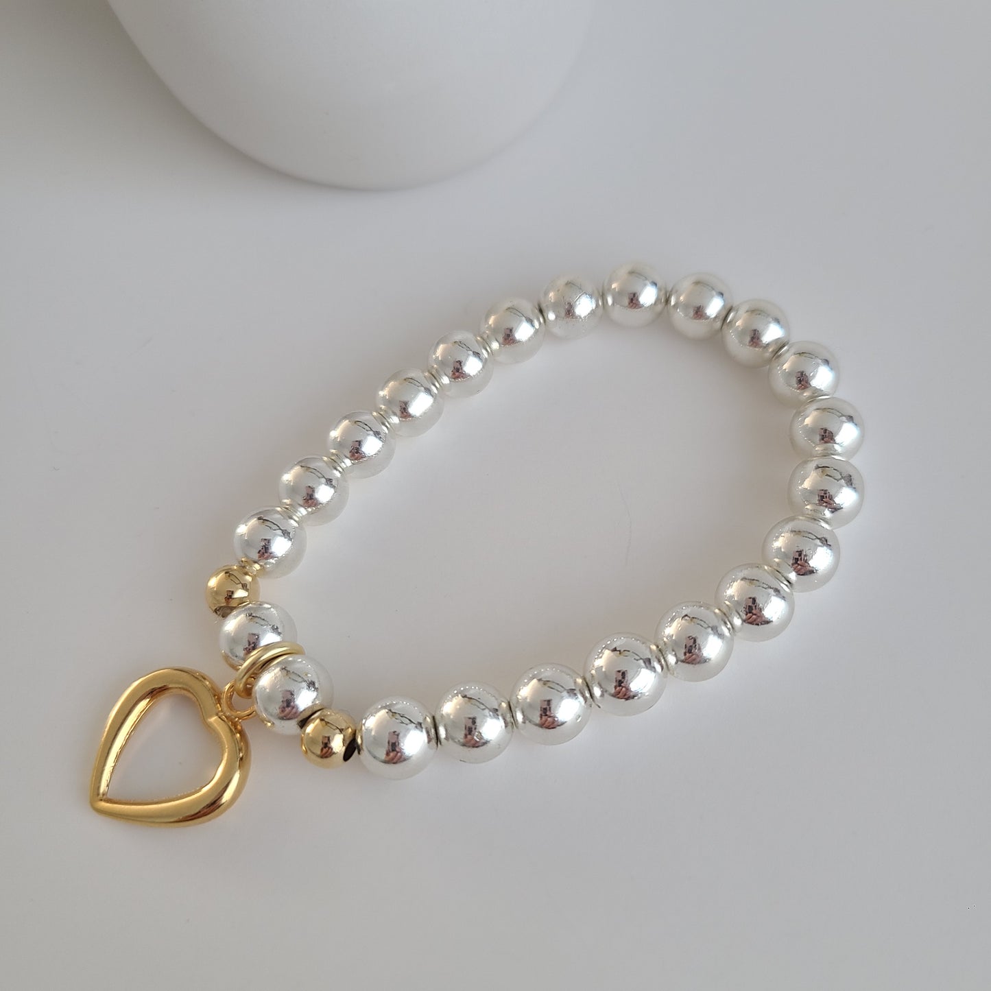 Bracelet coeur en argent et or